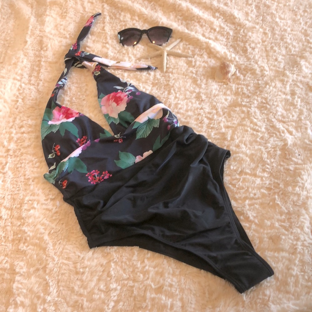 This classic yet edgy one piece will break necks!!